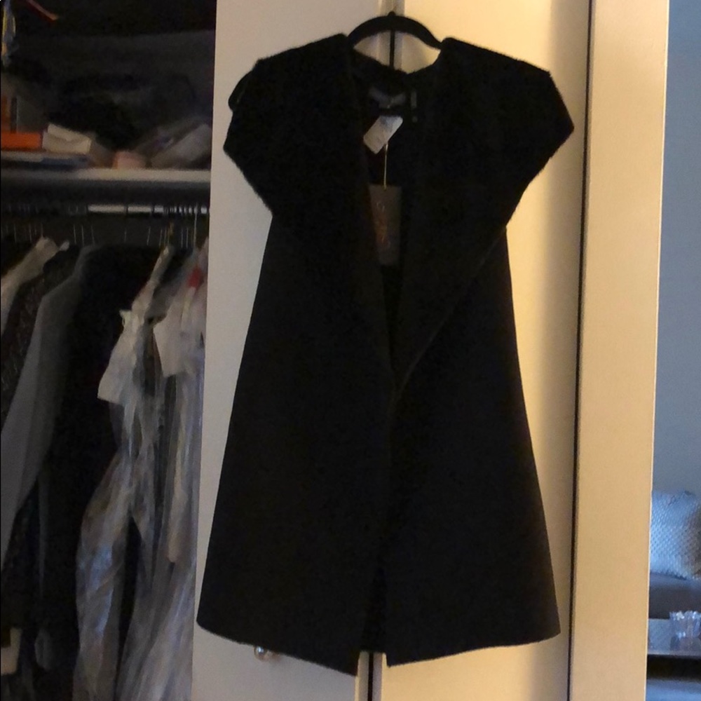 Long fur trimmed vest